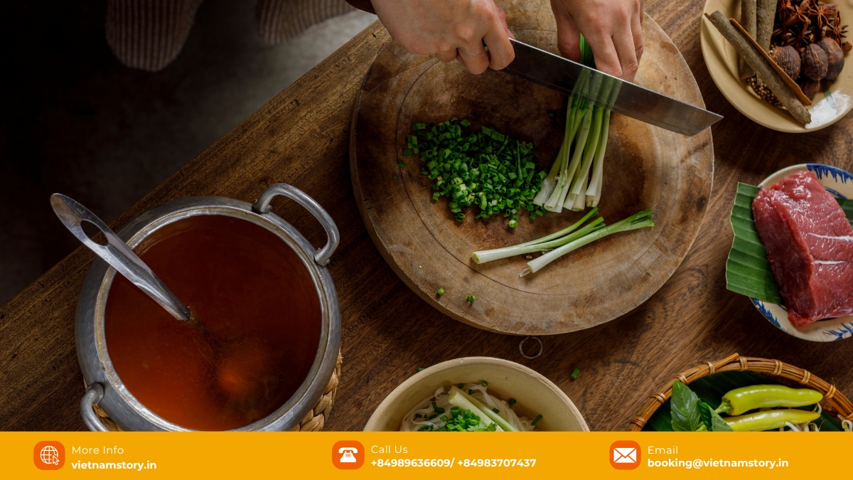 What is pho soup? It is a traditional dish of Vietnam that embraces cultural values. Close up of Pho soup showing broth, rice noodles, meat, and herbs.