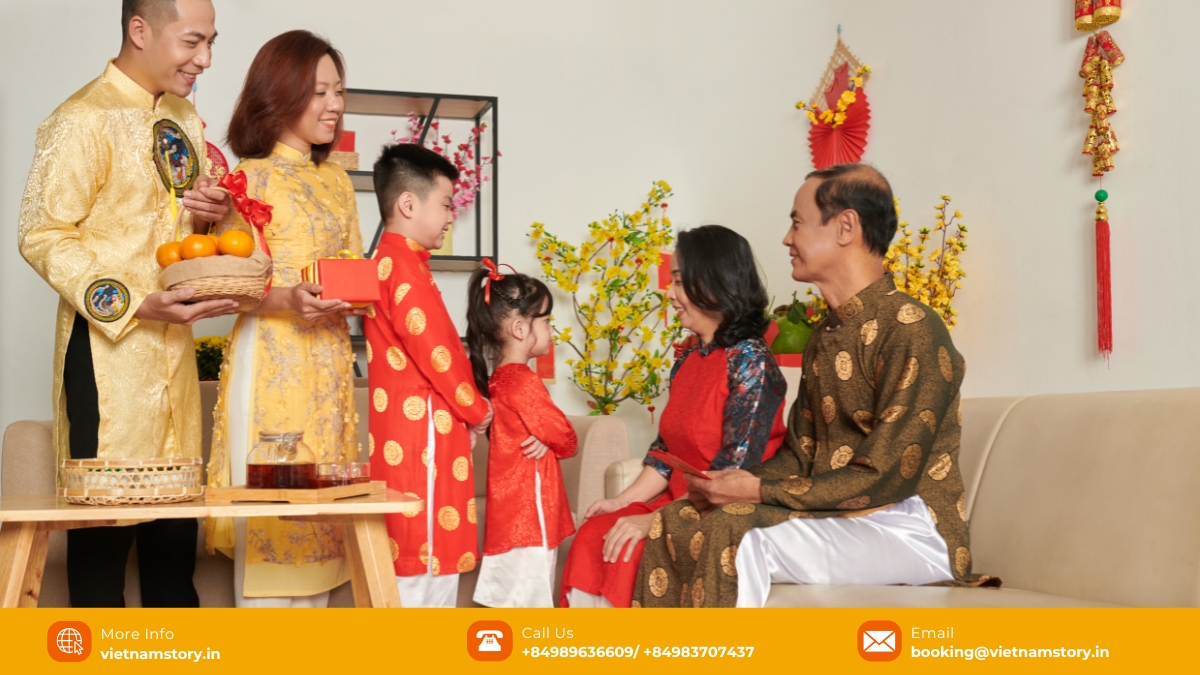Vietnam Newyear (Tet): Your Essential Guide to Vietnam's Biggest Celebration 5 Child receiving Li Xi lucky money in a red envelope during Vietnam Newyear Tet
