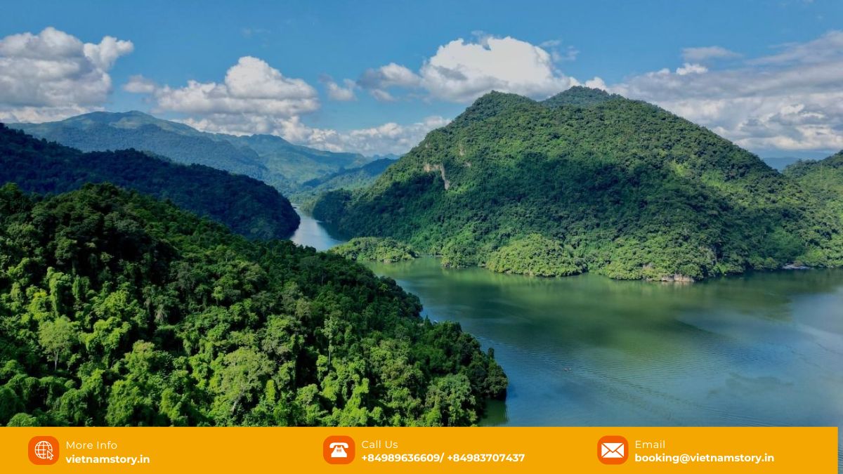 Discover the Breathtaking Natural Wonders in Vietnam: Your Guide to Unforgettable Tours 8 The serene Ba Be Lake within Ba Be National Park, showcasing the lush green natural wonders near Hanoi.