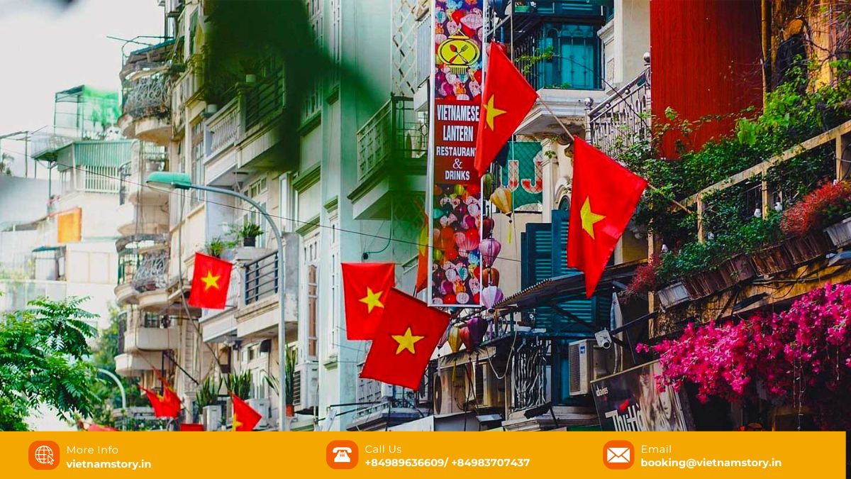 Understanding Vietnamese Reunification Day: History, Significance, and Celebrations 4 Citizens hoisting vibrant Vietnamese flags on Reunification Day, April 30th